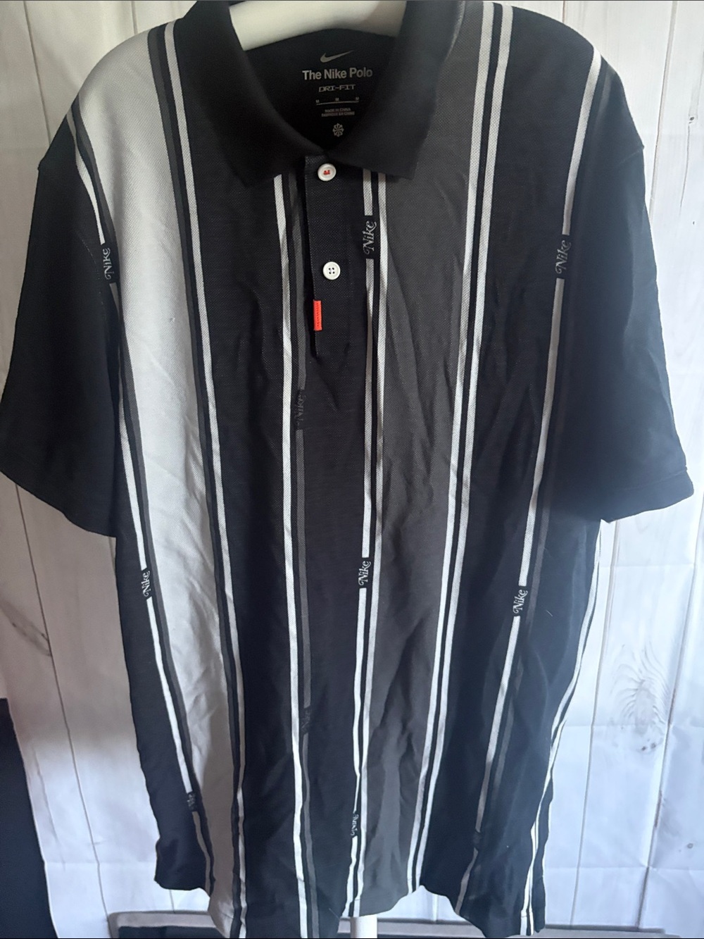 Nike Men’s Black & White Vertical Stripe Polo
